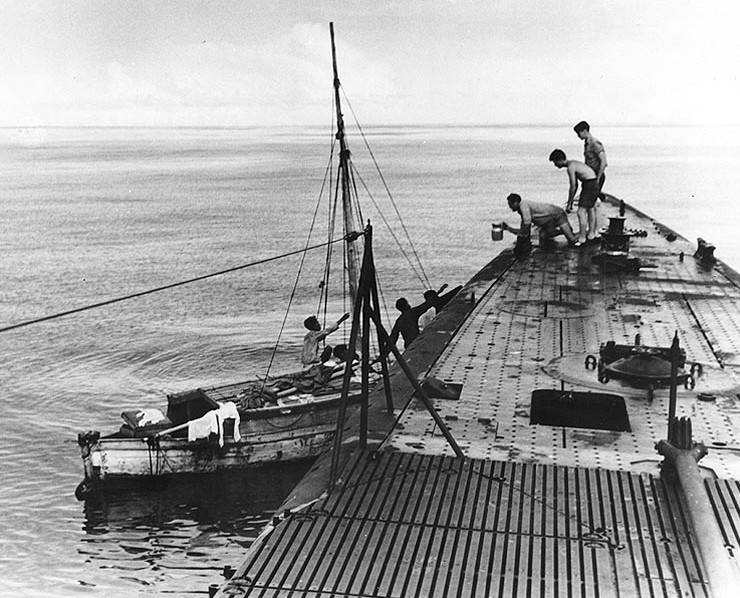 USS Wahoo providing food and water to crew of a becalmed fishing boat, circa Jan 1943; three fishermen had already died before being discovered by Wahoo