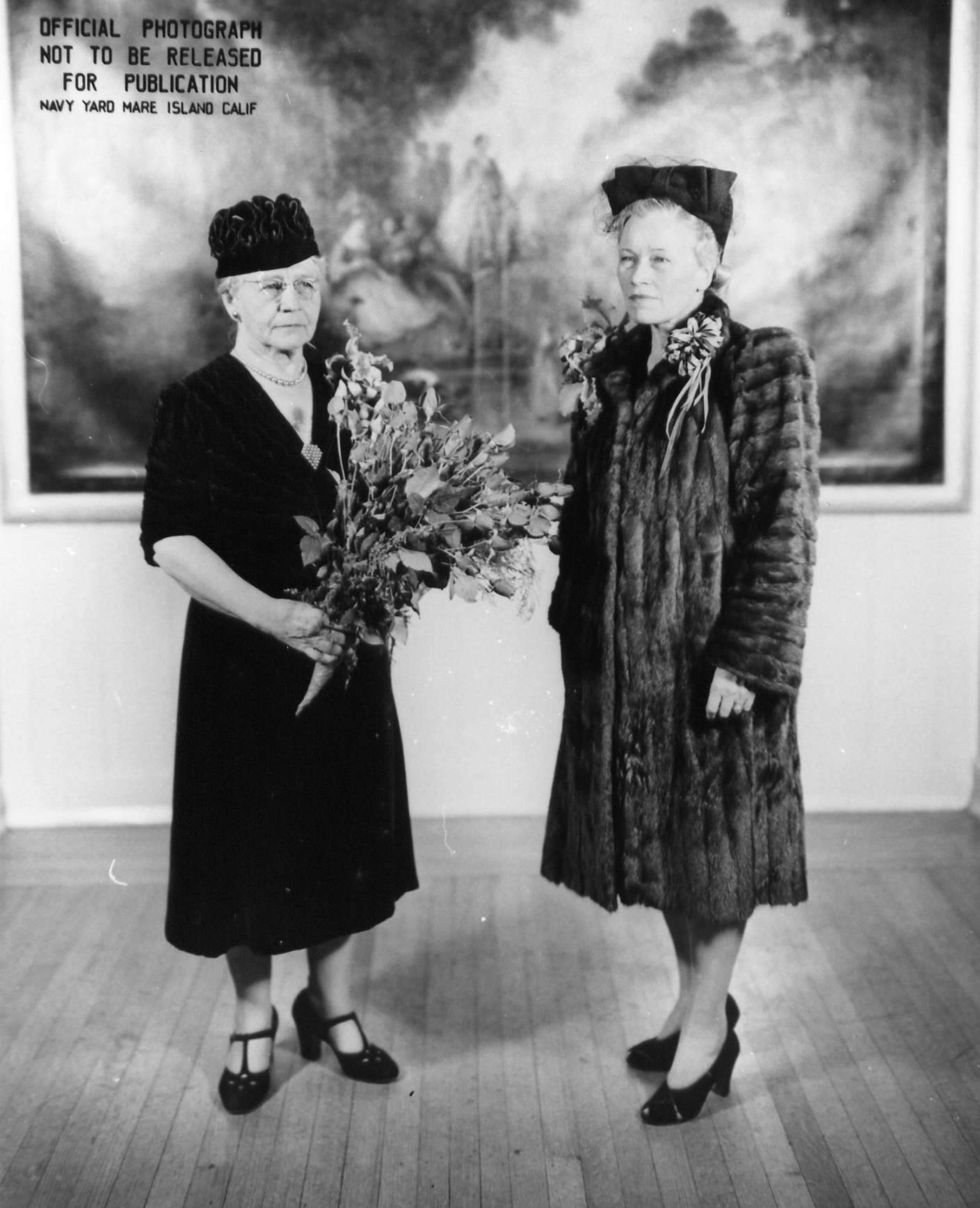 Matron of Honor Mrs. A. F. Huntington and Sponsor Mrs. William C. Baker after the launching ceremony of Wahoo, Mare Island Navy Yard, Vallejo, California, United States, 14 Feb 1942