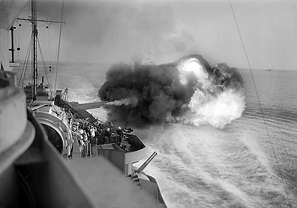 Warspite bombarding enemy positions at Catania, Sicily as seen from Warspite's bridge, Jul 1943