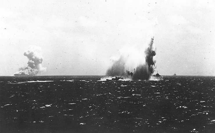 Destroyer O'Brien torpedoed by submarine while Wasp burned in background, 15 Sep 1942