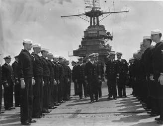 Captain Forrest Sherman, Commander Michael Kernodle, and Lieutenant Commander John Shea aboard USS Wasp, circa 1942, side 1 of photograph