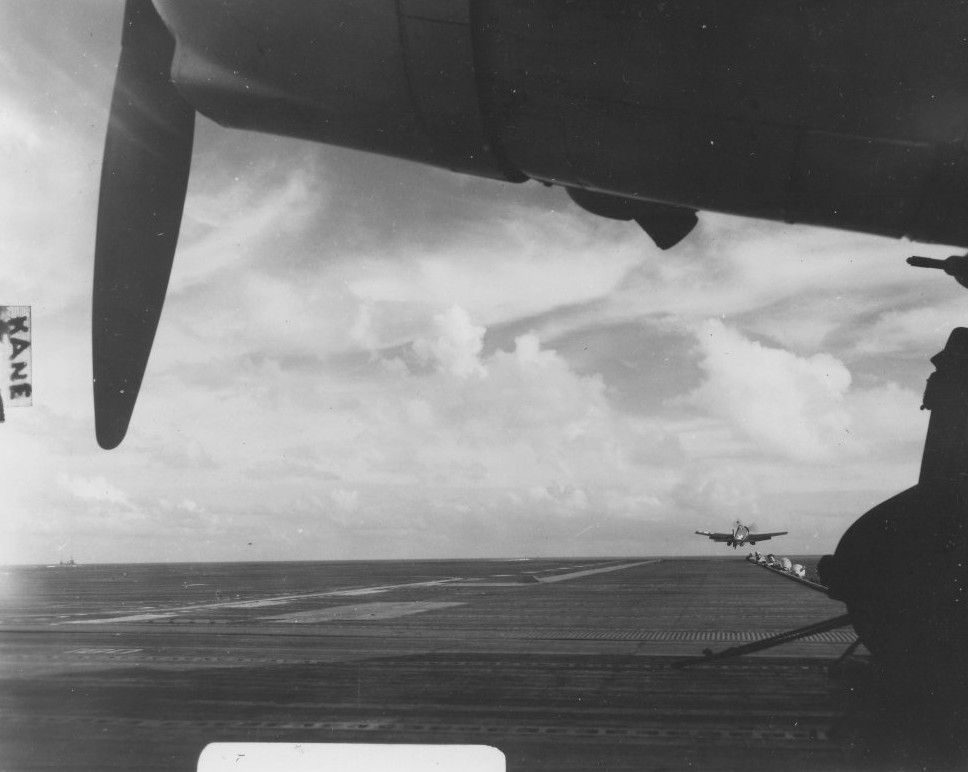 USS Wasp launching aircraft to search for survivors following Typhoon Cobra, 23 Dec 1944