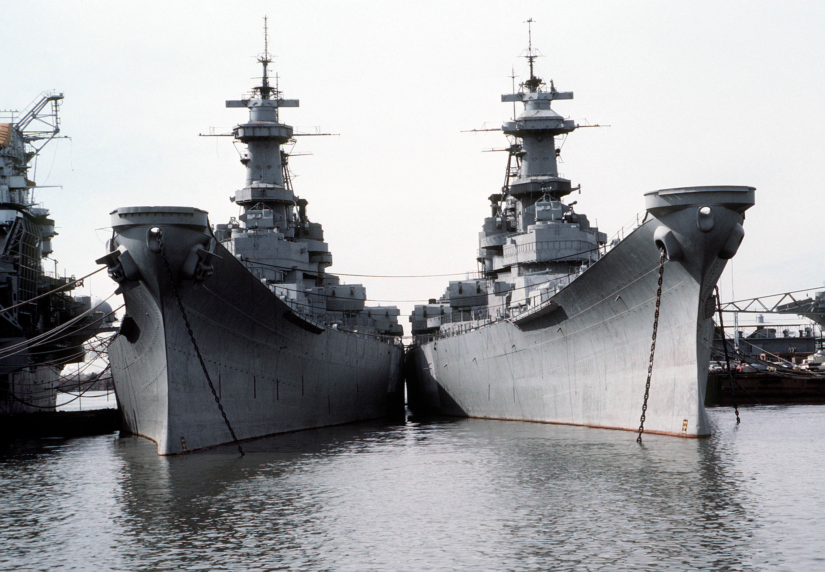 Inactivated US Navy battleships Iowa and Wisconsin docked at Philadelphia, Pennsylvania, United States, 26 Feb 1982