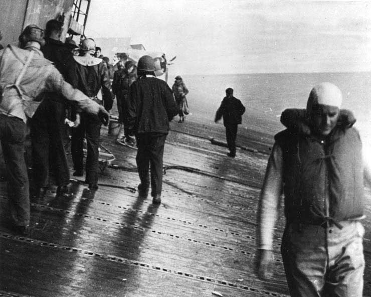 Crew of Yorktown struggled to maintain balance as the ship listed, 4 Jun 1942