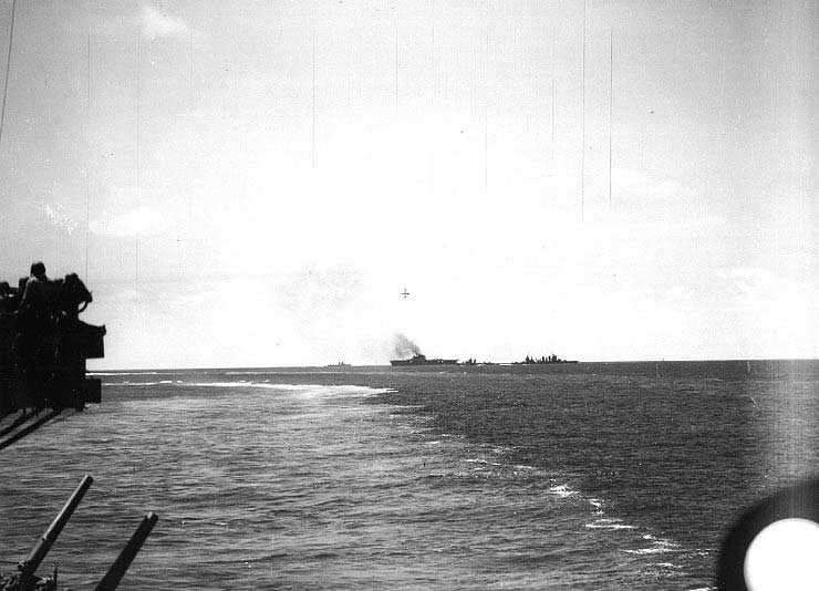 Pensacola observed as disabled Yorktown was surrounded by escorts, just after noon, 4 Jun 1942, photo 1 of 2