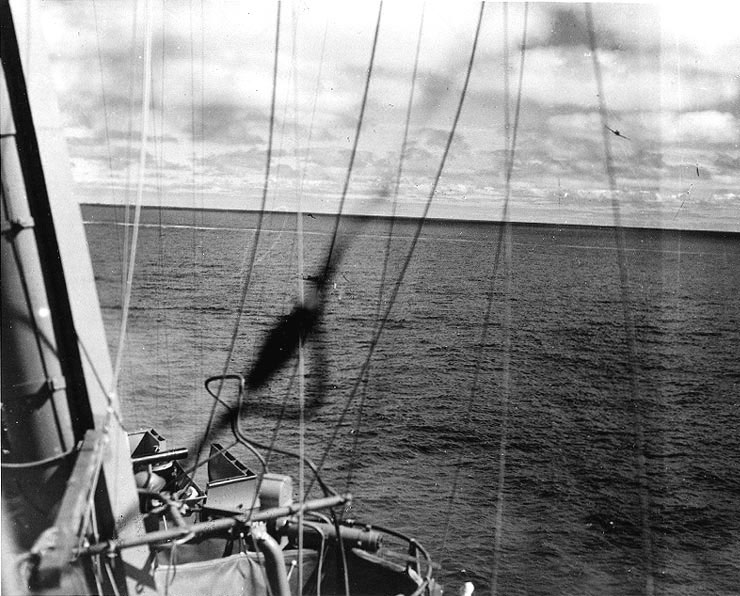A Japanese Type 97 torpedo aircraft (upper right) approached Yorktown during the mid-afternoon torpedo attack by planes from the carrier Hiryu, 4 Jun 1942