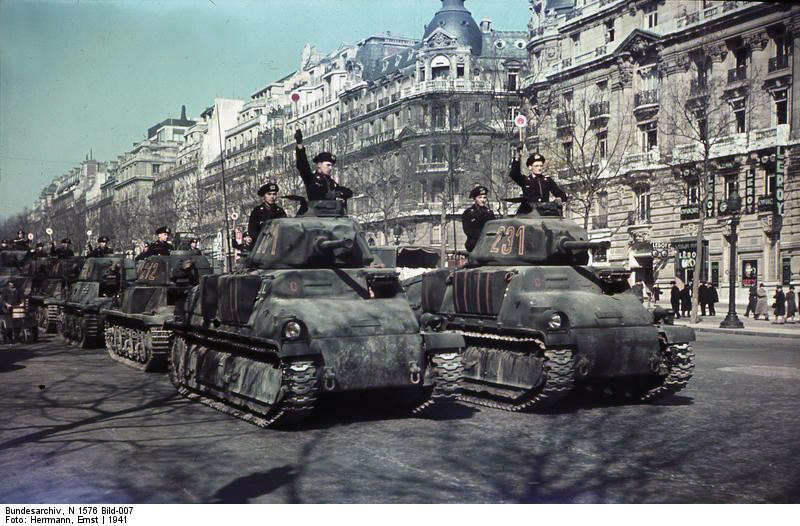 German parade of captured French AMC 35 S medium tanks and H35 light tanks, Paris, France, 1941