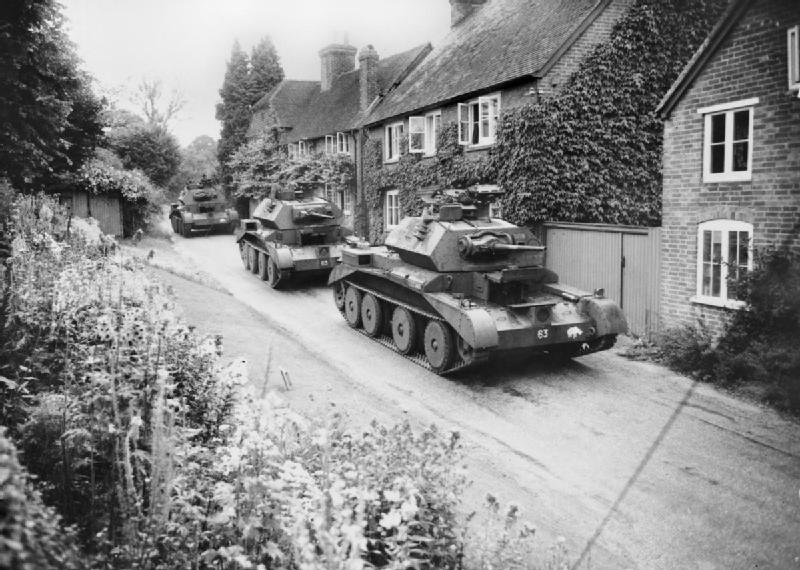 Cruiser Mk IV tanks of 5th Royal Tank Regiment of 3rd Armoured Brigade of British 1st Armoured Division in a village in Surrey County, England, United Kingdom, Jul 1940, photo 1 of 2