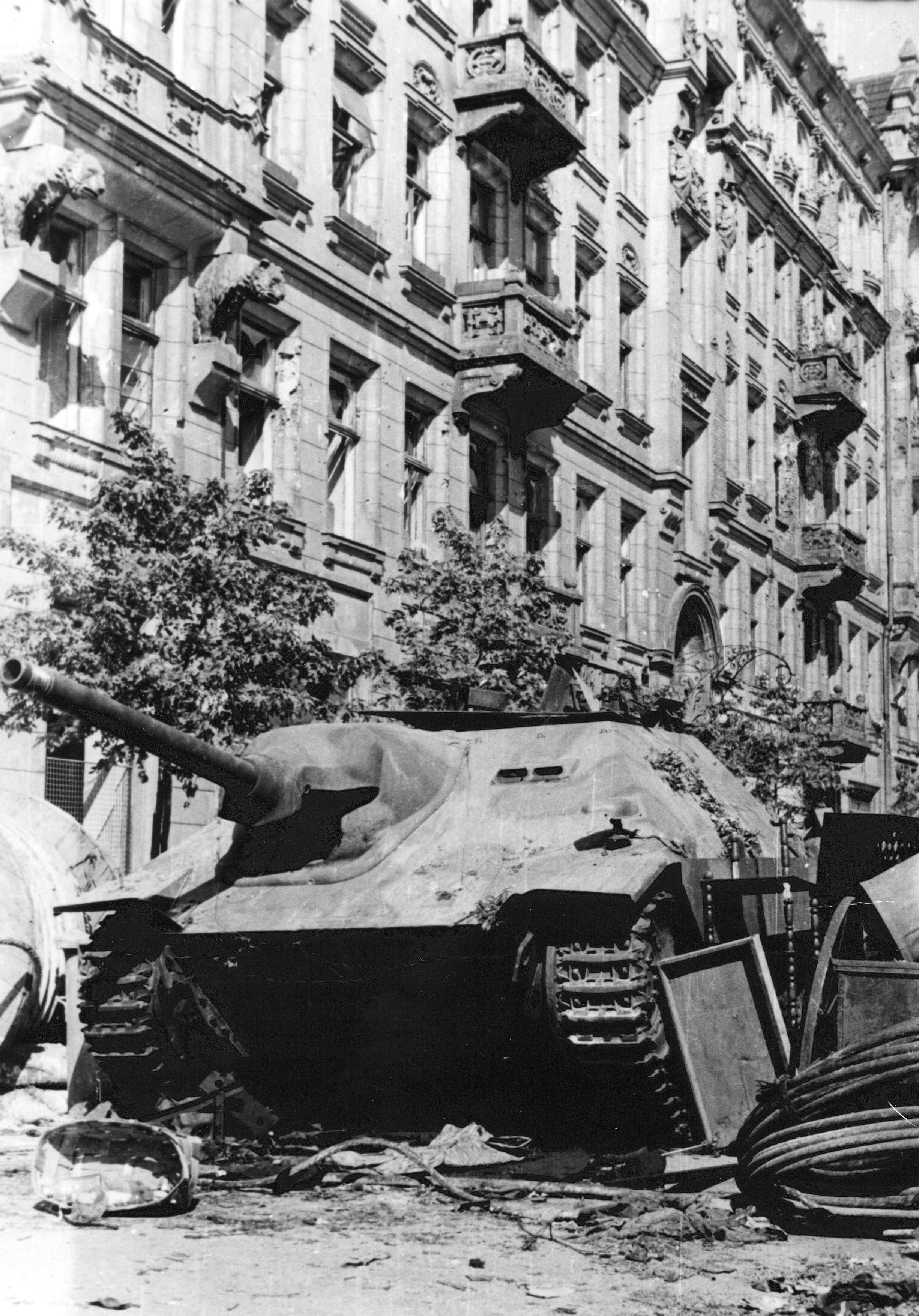 Polish barricade at Napoleon Square, Warsaw, Poland, 3 Aug 1944, photo 2 of 4; note captured Jagdpanzer 38(t) tank destroyer as part of barricade