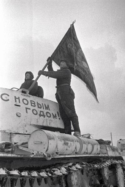 Soviet tank crew raising a flag on a KV-1 heavy tank, Moscow, Russia, 31 Dec 1941