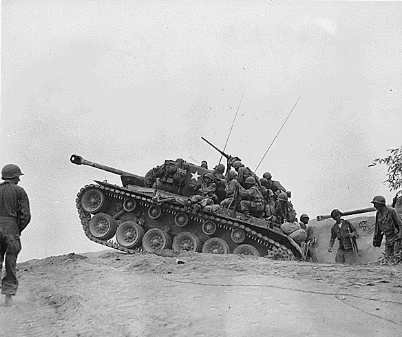 Soldiers of US 9th Infantry Regiment on a M26 Pershing tank, near the Nakdong River, Korea, 3 Sep 1950
