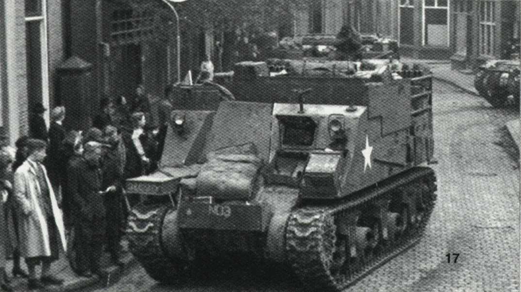 Kangaroo armored command post vehicle converted from M7 Priest vehicle in a Dutch town, followed by a Kangaroo armored personnel carrier converted from Ram tank, circa 1945