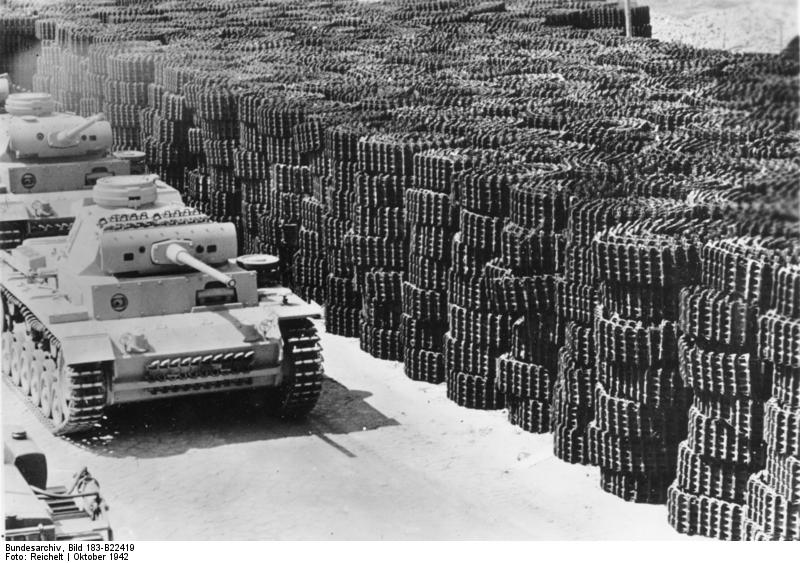 Near-complete German Panzer III tanks at a factory, Germany, Oct 1942; note stockpile of tank tracks