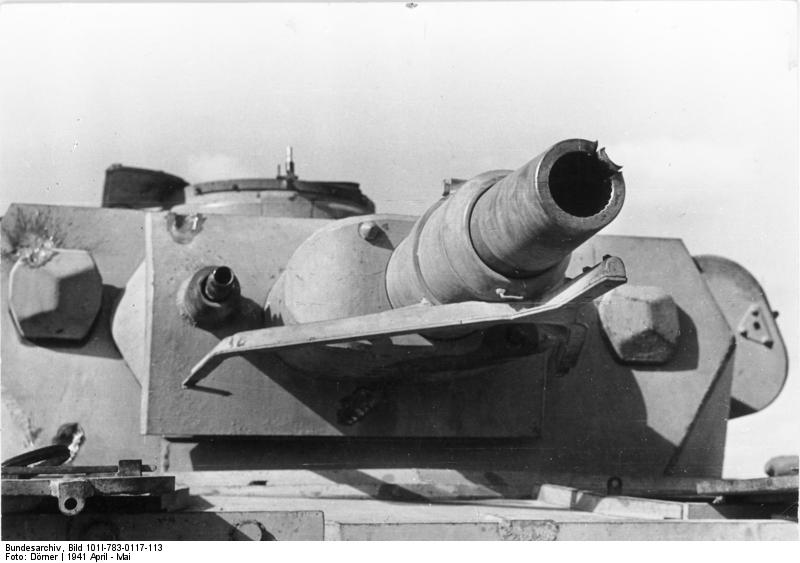 Close up of a German Panzer IV Ausf. E medium tank gun and turret, showing signs of multiple hits, North Africa, Apr 1941