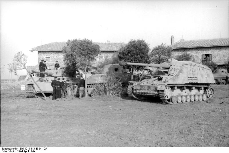 German Tiger I heavy tank and Hornisse/Nashorn tank destroyer in Italy, Apr-May 1944; note disabled American M4 Sherman medium tank between them