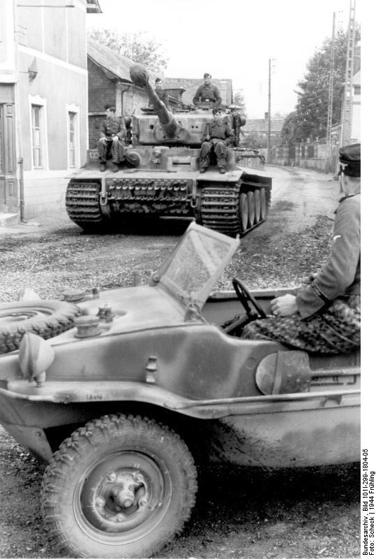 Tiger I heavy tank of the German 1st SS Division Leibstandarte SS Adolf Hitler and Schwimmwagen vehicle in Morgny, France, 7 Jun 1944, photo 1 of 3