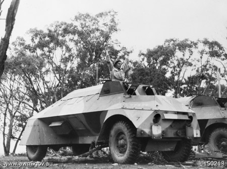 Light Armoured Car (Aust) 'Rover', Puckapunyal military base, Victoria, Australia, Jun 1942; noting driver giving the 'start up' signal