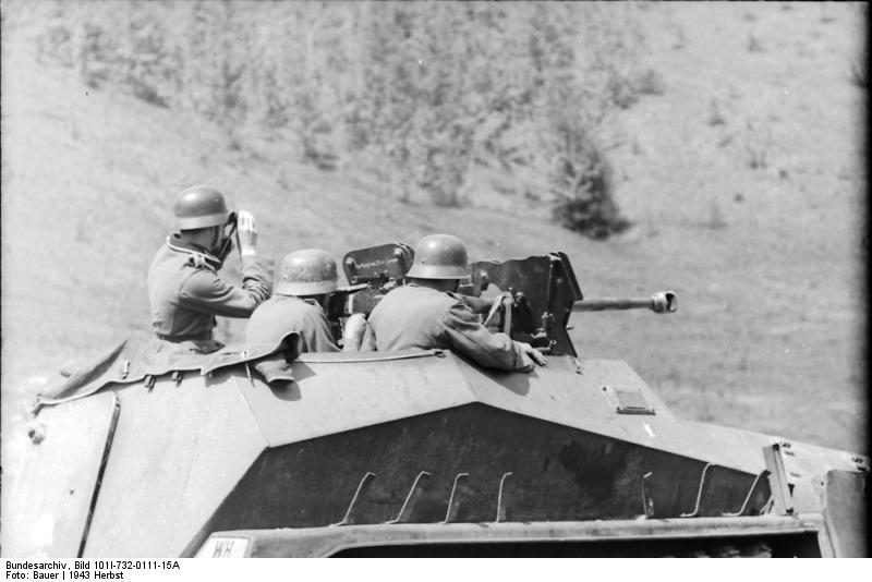 German troops of Großdeutschland Division firing a 2.8 cm sPzB 41 anti-tank gun aboard a SdKfz. 250/10 half-track vehicle on the northern Eastern Front, 23 Sep 1943