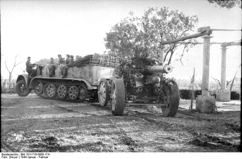 German SdKfz. 7 half-track vehicle towing 15 cm sFH 18 field gun, Italy, Jan 1944