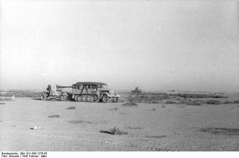 German SdKfz. 7 half-track vehicle towing 8.8 cm FlaK gun, North Africa, Feb 1942