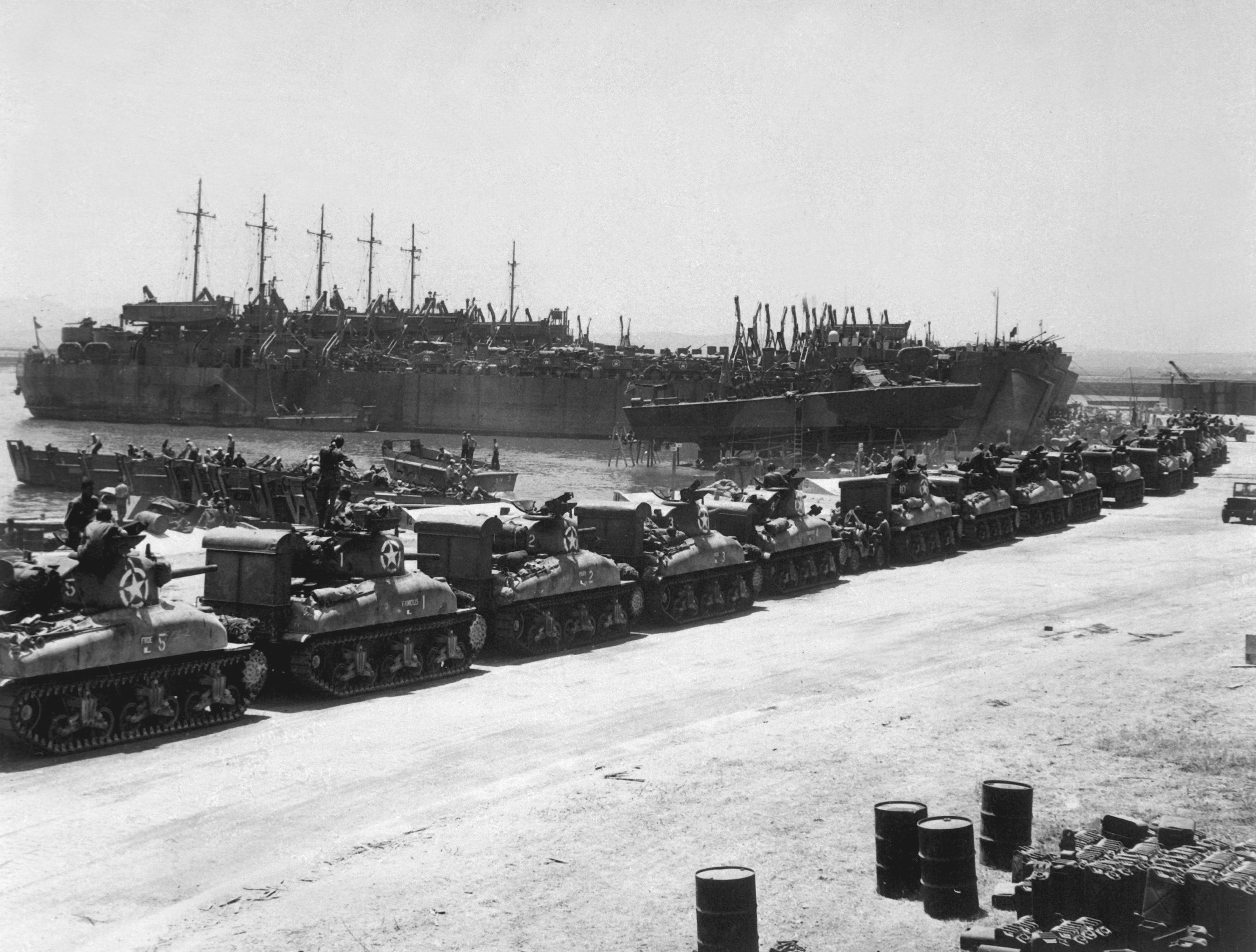 M4 Sherman tanks being loaded onto LSTs for Operation Husky, Pêcherie, Bizerte, Tunisia, 7 Jul 1943