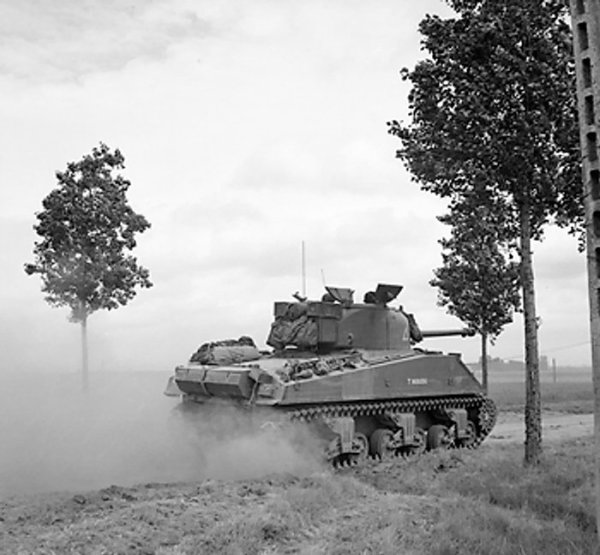 Sherman tank of 24th Lancers, UK 8th Armored Brigade, near St Leger, France, 11 Jun 1944