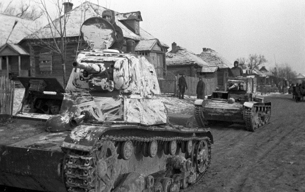 Soviet T-26 tanks in a Russian village, 10 Oct 1941
