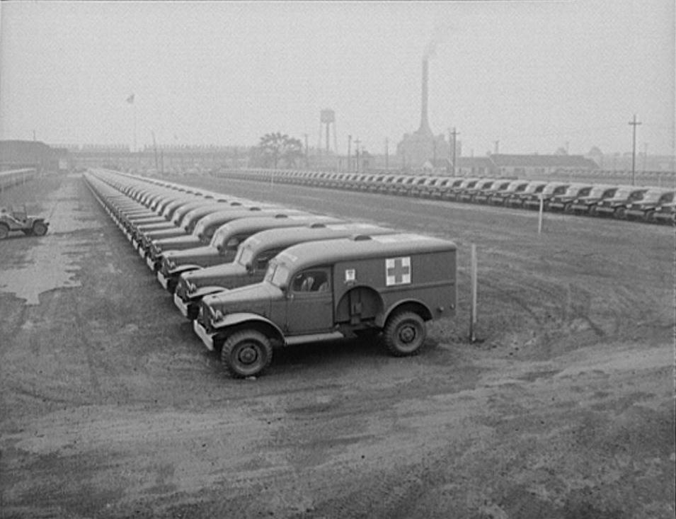Acres of Dodge WC54 3/4-ton field ambulances outside a factory, Detroit, Michigan, United States, Aug 1942