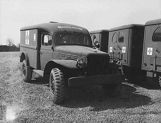 New Dodge WC54 3/4-ton field ambulances awaiting embarkation overseas, Detroit, Michigan, United States, 1943-1945