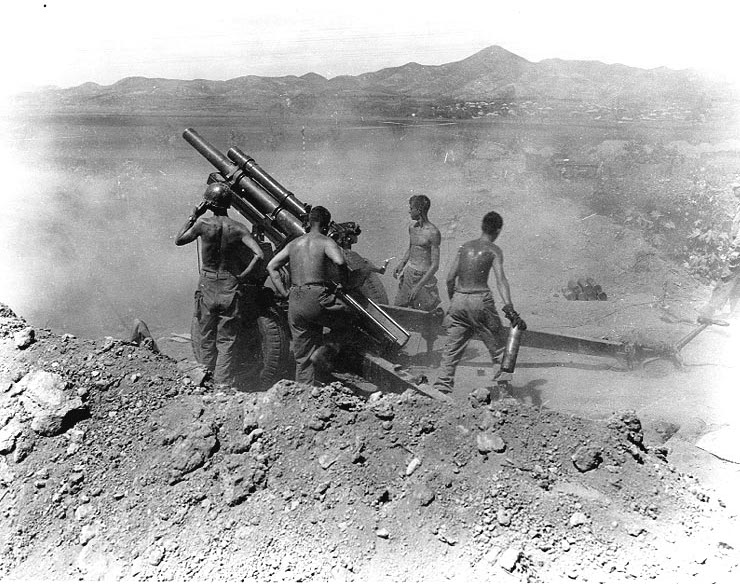 105mm Howitzer M2A1 crew of 64th Field Artillery Battalion, US 25th Infantry Division near Uirson, Korea, 27 Aug 1950
