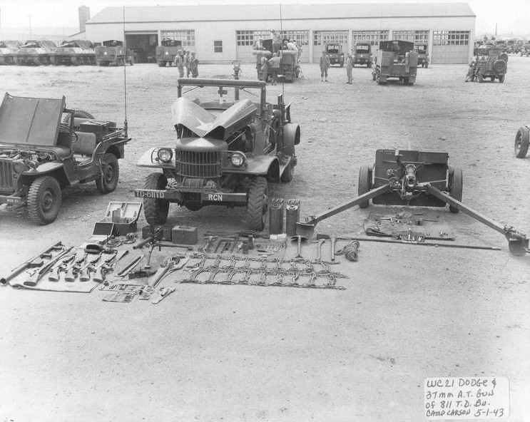 Jeep, WC-4 truck, and 37 mm Gun M3 of US 811th Tank Destroyer Battalion, Camp Carson, Colorado, United States, 1 May 1943
