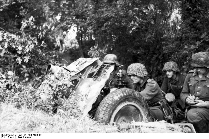 German paratroopers with a 7.5 cm le.IG 18 infantry gun, France, 21 Jun 1944