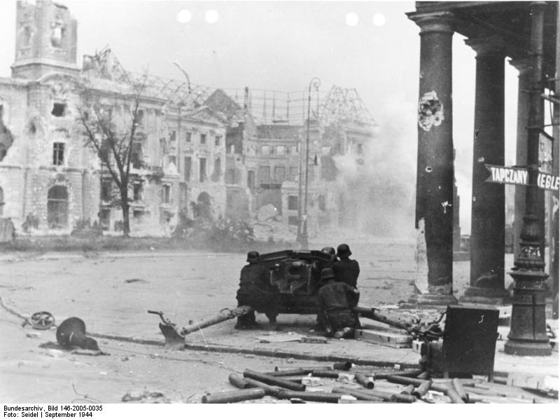 German 7.5 cm PaK 40 anti-tank gun and its crew fighting in the streets of Warsaw, Poland during the Warsaw Uprising, 11 Sep 1944; note heavily damaged buildings