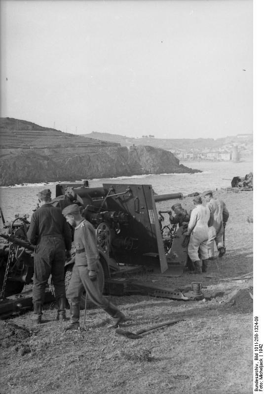 German Army 8.8 cm FlaK 36 gun being mounted onto its carriage, southern France, 1942, photo 1 of 3