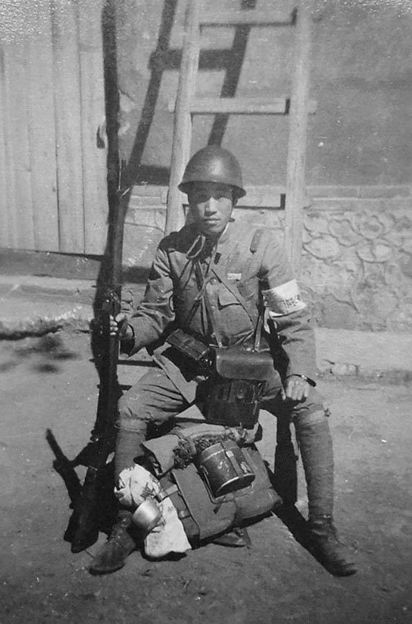 Japanese Army infantryman with Type 38 rifle and other gear, date unknown