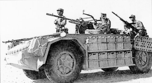 Italian troops on an AS 42 armored car equipped with Breda Model 35 anti-aircraft gun, North Africa, Mar 1943