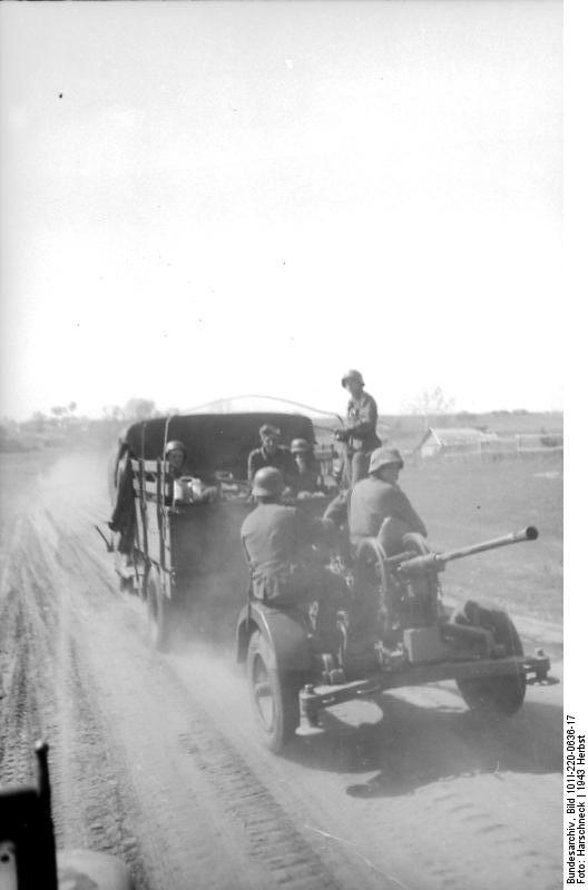 German truck towing a 2 cm FlaK 38 anti-aircraft gun, fall of 1943