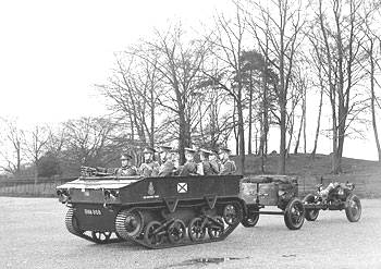 Light Dragon tractor towing a 3.7-inch howitzer on Carriage Mk IV and limber of A Battery, Royal Horse Artillery, circa 1938