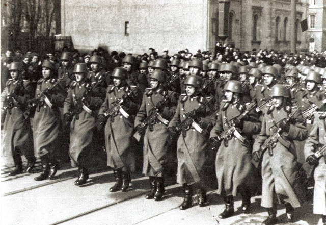 East German Army troops marching, circa 1950; note StG44 assault rifles and M-54 helmets