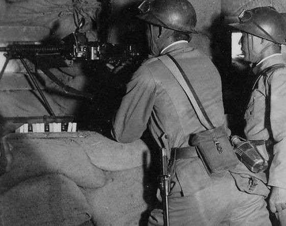 Japanese Type 11 machine gun and crew in a bunker, circa 1940s