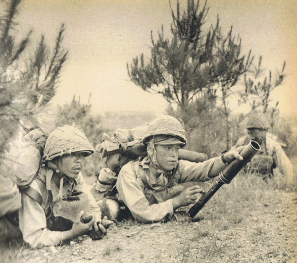 Troops of Japanese 13th Army operating a Type 89 grenade launcher, Jinhua, Zhejiang, China, 30 May 1942