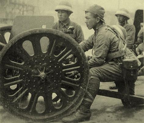 Japanese Type 94 anti-tank gun and crew in China, date unknown